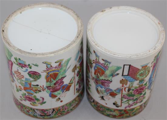 A pair of Chinese Canton-decorated famille rose brush pots, Daoguang period, 16cm, one cracked